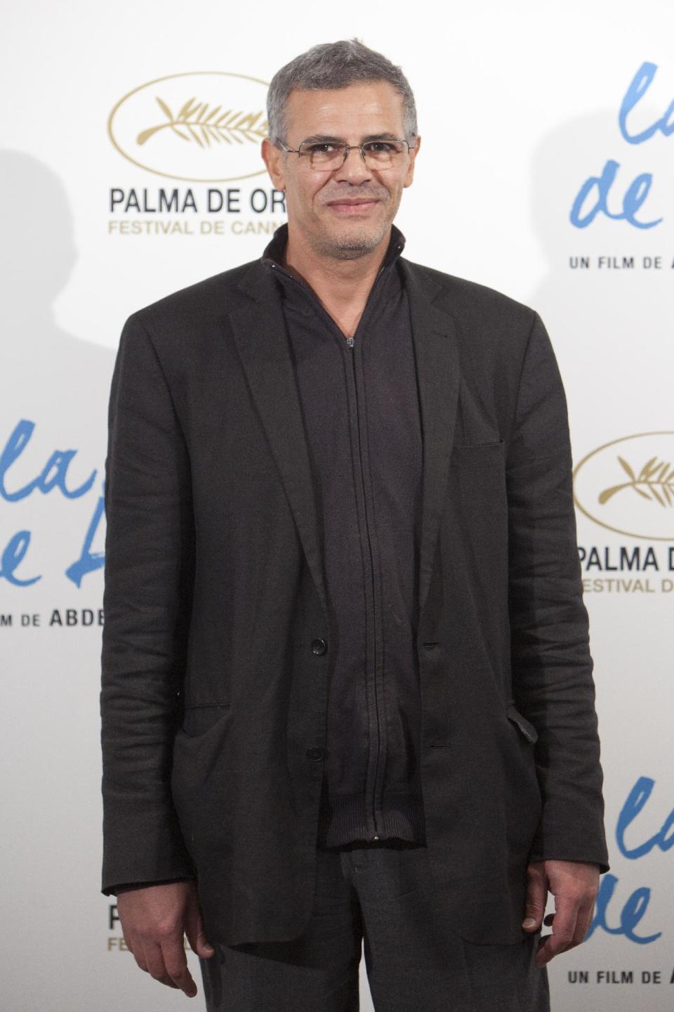 FILE - In this Oct. 22, 2013 file photo, Director Abdellatif Kechiche attends "La Vida De Adele" (Blue Is The Warmest Color) photocall at the Santo Mauro Hotel in Madrid, Spain. Four of the five directors of Golden Globe-nominated foreign-language films, Paolo Sorrentino, "A Great Beauty," Kechiche, "Blue Is the Warmest Color," Thomas Vinterberg, "The Hunt," and Asghar Farhadi, "The Past," gather in Hollywood for a panel symposium on their films nominated for Best Foreign Language Film at The Egyptian Theatre on Saturday, Jan. 11, 2014. Hayao Miyazaki, whose film, "The Wind Rises" is also nominated in the same category, is unable to attend. (AP Photo/Abraham Caro Marin, File)