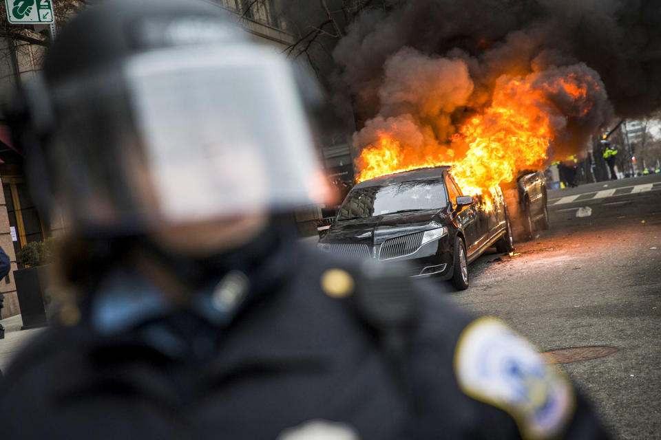 Anti-Trump protestors set a limousine on fire. (Samuel Corum / Anadolu via Getty Images file)