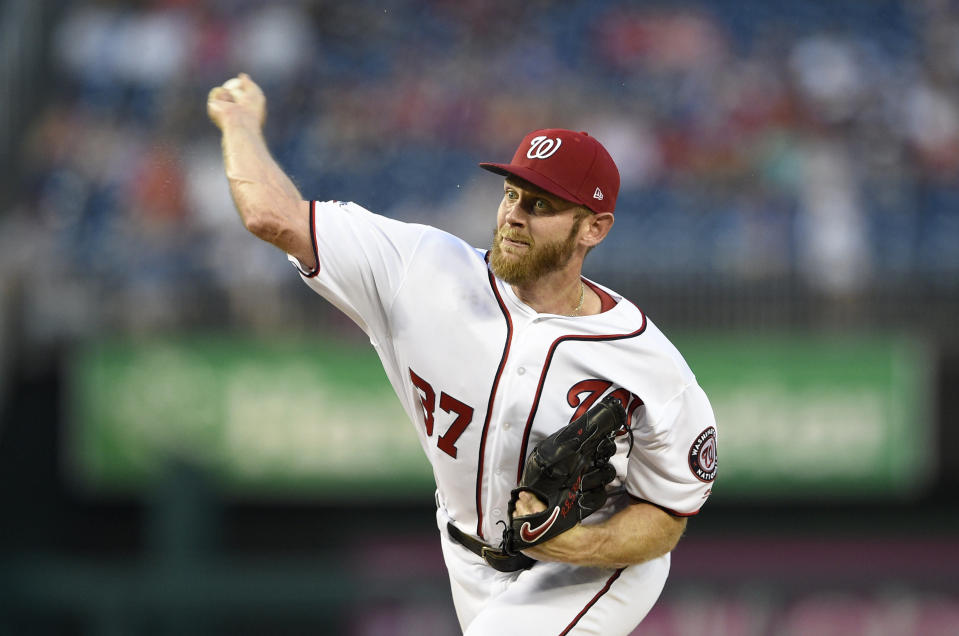 Washington Nationals starting pitcher Stephen Strasburg delivers a pitch during a baseball game against the Chicago Cubs, Thursday, Sept. 6, 2018, in Washington. (AP Photo/Nick Wass)