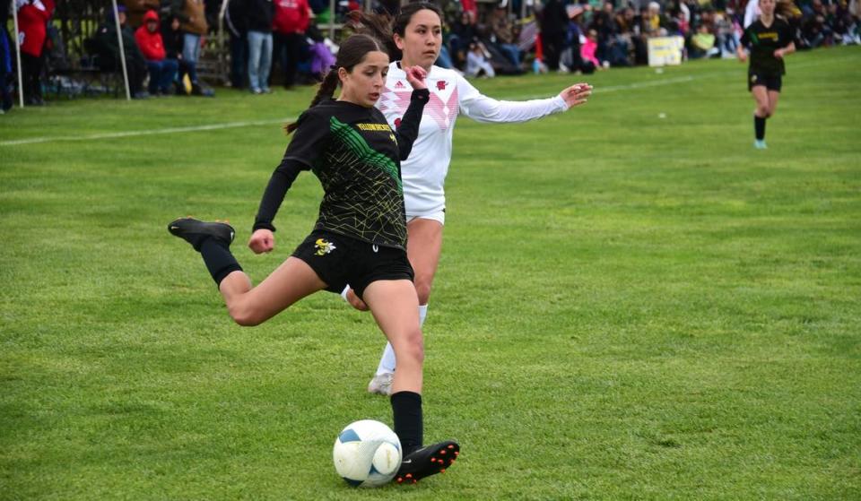 Hilmar High freshman Raylynn Mendoza (23) fires a pass during the NorCal Regional Division V championship against Winters on Saturday, March 2, 2024 at Hilmar High School.