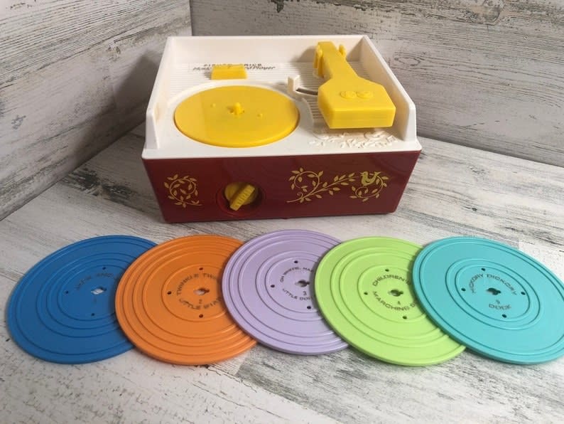 1970s-era toy record player with five different discs
