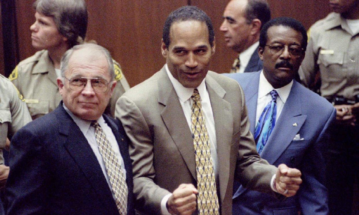 <span>OJ Simpson after he is found not guilty of murdering his wife, Nicole Brown Simpson, and Ronald Goldman, 1995.</span><span>Photograph: Reuters</span>