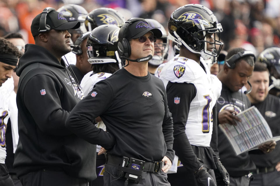 Baltimore Ravens head coach John Harbaugh looks on during the first half of an NFL football game against the Cincinnati Bengals, Sunday, Dec. 26, 2021, in Cincinnati. (AP Photo/Jeff Dean)