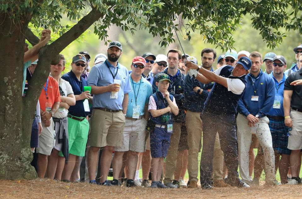 Phil Mickelson hits out of the trees on No. 9 during the second round of the 2018 Masters Tournament at Augusta National Golf Club on April 6, 2018 in Augusta, Georgia. (Getty)