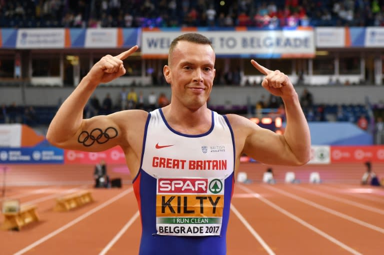 Britain's Richard Kilty celebrates after winning the men's 60m final at the 2017 European Athletics Indoor Championships in Belgrade on March 4, 2017