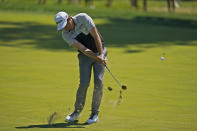 Keegan Bradley hits from the 12th fairway during the first round of the BMW Championship golf tournament at Wilmington Country Club, Thursday, Aug. 18, 2022, in Wilmington, Del. (AP Photo/Julio Cortez)