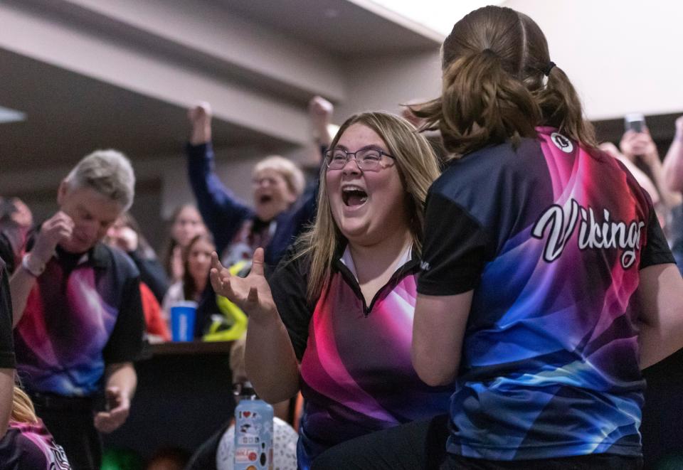 Topeka Seaman celebrate after placing first in the 5-1A State Bowling Tournament held at Northrock Lanes in Wichita on Friday, March 4, 2022.