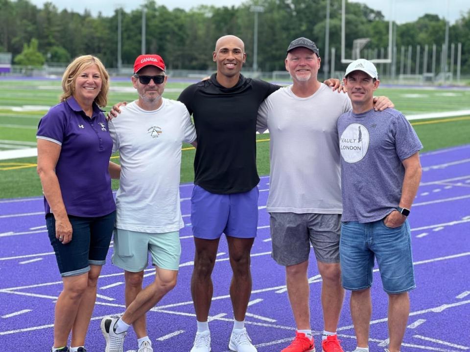 Damian Warner, centre with his coaching team, left to right: Vickie Croley, Gar Leyshon, Dennis Nielsen and Dave Collins. (Devin Heroux/CBC Sports - image credit)