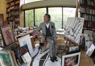 Paris-based Japanese designer Kenzo Takada, aka "Kenzo", poses in the workshop on March 24, 2009 of his 1.362 m2 loft in Paris, during a press presentation of his collection of art works, furnitures which will be auctionned on June 16 and 17, 2009 at Drouot Montaigne auction house. AFP PHOTO FRANCOIS GUILLOT (Photo credit should read FRANCOIS GUILLOT/AFP via Getty Images)