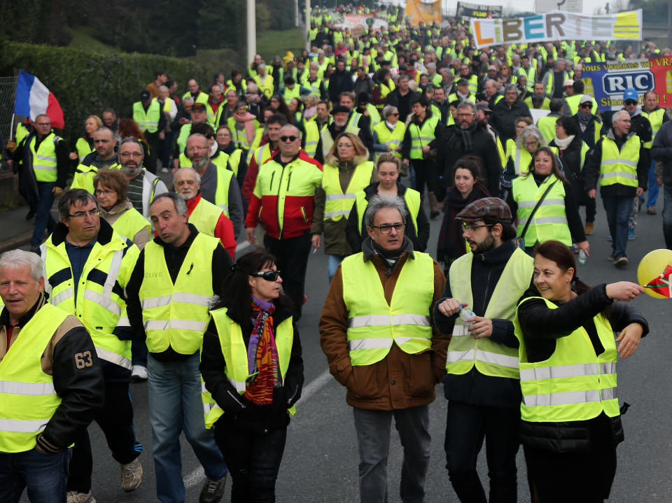 Yellow vest protesters demonstrate in Saint Jean De Luz, France, Saturday, Jan. 19, 2019. Yellow vest protesters are planning rallies in several French cities despite a national debate launched this week by President Emmanuel Macron aimed at assuaging their anger.(AP Photo/Bob Edme)