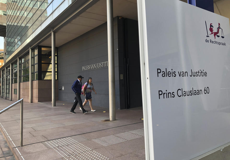 The outside of the court, at the start of the court case for on a 74-year-old woman suffering from dementia who was euthanized three years ago despite some indications that she might have changed her mind, as the trial opens in The Hague, Netherlands, Monday Aug. 26, 2019. The landmark euthanasia trial seeks to pinpoint what to do with dementia patients who have previously stated their wish to die under certain circumstances but later might have second thoughts. (AP Photo/Aleks Furtula)