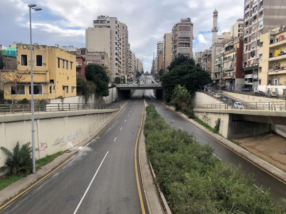 A view of empty road as Lebanon tightened lockdown and introduced a 24-hour curfew to curb the spread of the coronavirus disease (COVID-19) in Beirut (REUTERS)