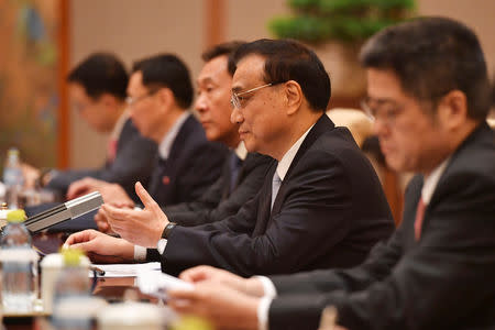 Chinese Premier Li Keqiang speaks with United Arab Emirates Vice President and Prime Minister Sheikh Mohammed bin Rashid Al Maktoum (not pictured) during their meeting at the Diaoyutai State Guesthouse in Beijing, China, April 25, 2019. Parker Song/Pool via REUTERS