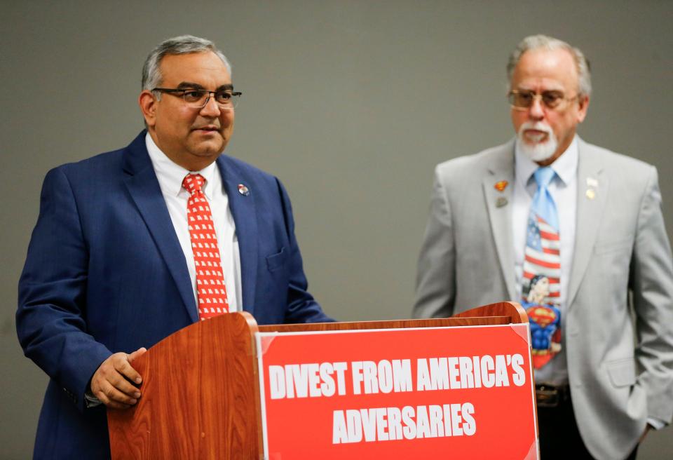 Missouri State Treasurer Vivek Malek and Branson Rep. Brian Seitz speak Thursday afternoon at the Greene County Elections Center in Springfield about Seitz'z bill to require public investments, like pensions and public endowments, to divest from countries that the U.S. has sanctioned or has classified as adversaries.