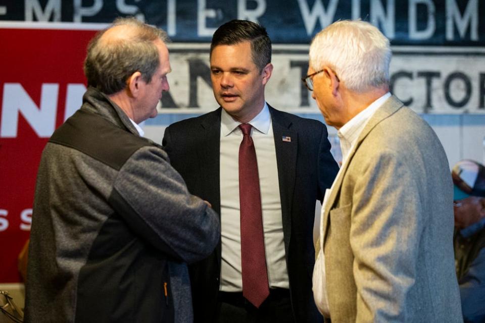 IA Sen. Zach Nunn, R-Bondurant, running in the Republican primary to represent Iowa's third district in the US House of Representatives, chats with Iowans Wednesday, April 27, 2022, at the Machine Shed in Urbandale, Iowa.