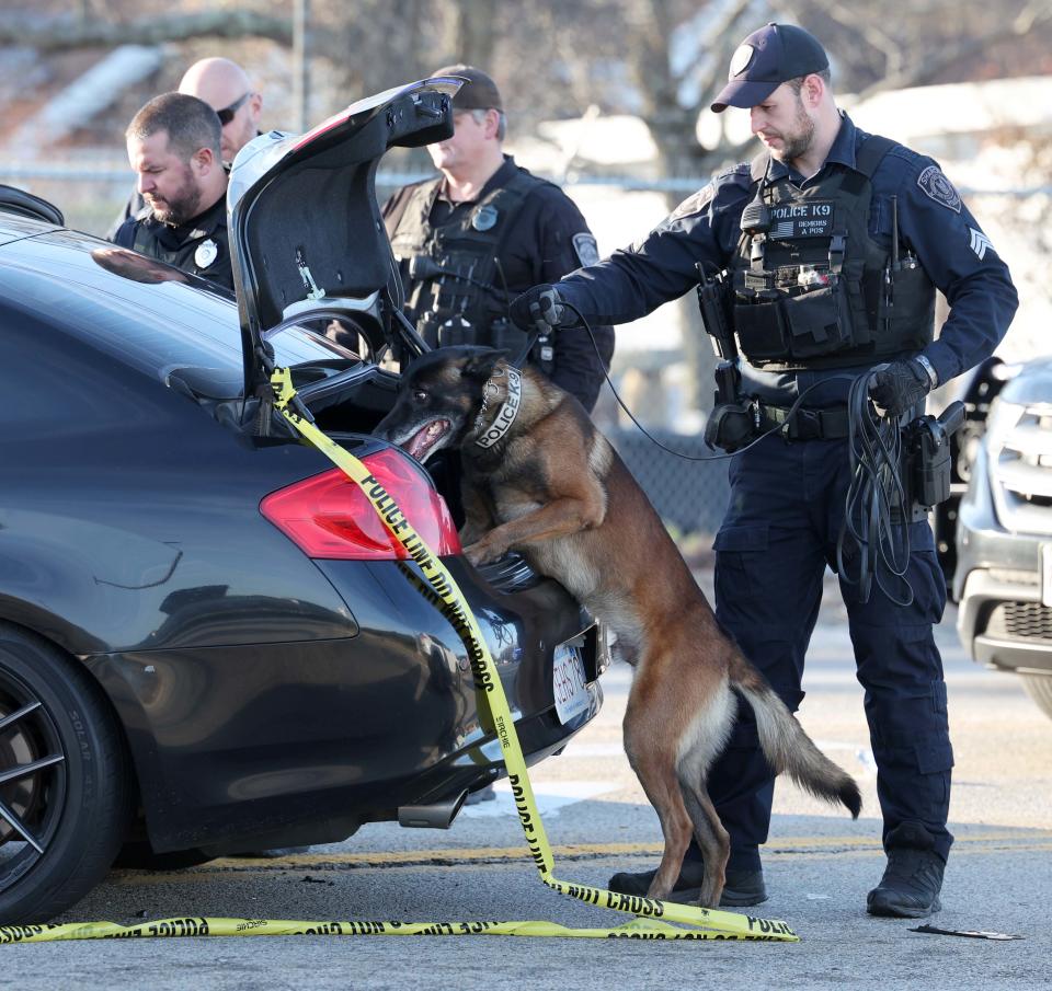 Stoughton police investigate a multiple vehicle crash at 1334 Park St. on Friday afternoon, Dec. 2, 2022. A black Infinity G37 that was struck by gunshots in Brockton was later involved in the four-vehicle crash in Stoughton, police said.