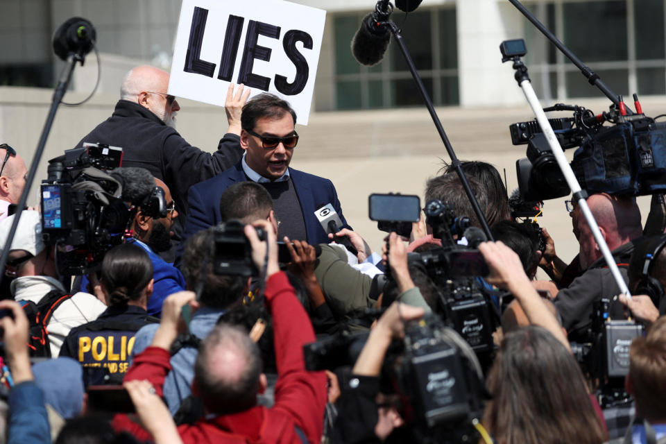 U.S. Rep. George Santos (R-New York) speaks to the media as he leaves Central Islip Federal Courthouse in Central Islip, New York, on May 10, 2023. / Credit: SHANNON STAPLETON / REUTERS