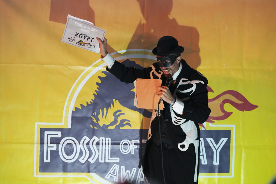 A Fossil of the Day Award goes to Egypt for not doing enough to fight climate change at the COP27 U.N. Climate Summit, Thursday, Nov. 17, 2022, in Sharm el-Sheikh, Egypt. (AP Photo/Peter Dejong)