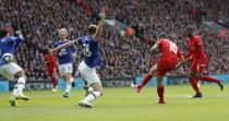 Britain Soccer Football - Liverpool v Everton - Premier League - Anfield - 1/4/17 Liverpool's Philippe Coutinho scores their second goal Action Images via Reuters / Carl Recine Livepic