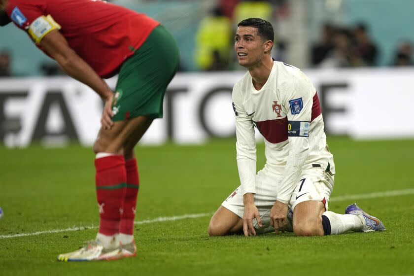 Portugal's Cristiano Ronaldo reacts after missing an opportunity to score during the World Cup quarterfinal soccer match between Morocco and Portugal, at Al Thumama Stadium in Doha, Qatar, Saturday, Dec. 10, 2022. (AP Photo/Martin Meissner)