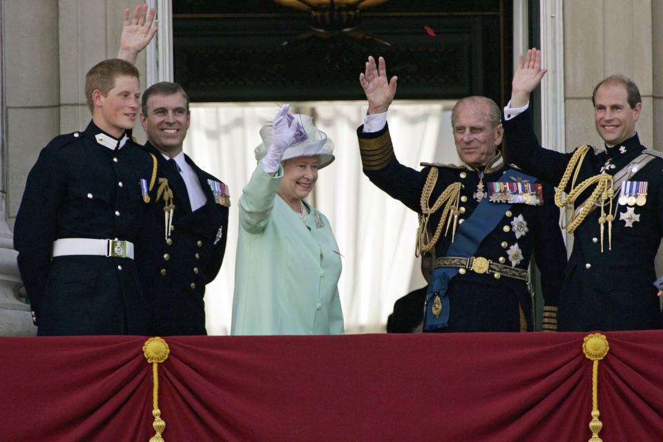 <p>Prince Harry, Prince Andrew, the Queen, Prince Philip and Prince Edward watch the flypast over The Mall of British and US Second World War aircraft on National Commemoration Day. Poppies were dropped from the Lancaster Bomber of the Battle Of Britain Memorial Flight as part of the flypast. (Getty)</p> 