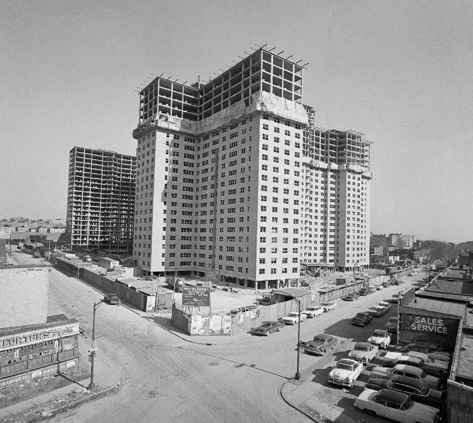 FILE - This Jan. 31, 1962 file photo shows apartment buildings under construction on the former site of Ebbets Field, former home of the Dodgers and Jackie Robinson, in the Brooklyn borough of New York. With the new movie "42" bringing the Jackie Robinson story to a whole new generation, fans young and old may be interested in seeing some of the places in Brooklyn connected to the Dodger who integrated Major League Baseball. (AP Photo/Ruben Goldberg, file)