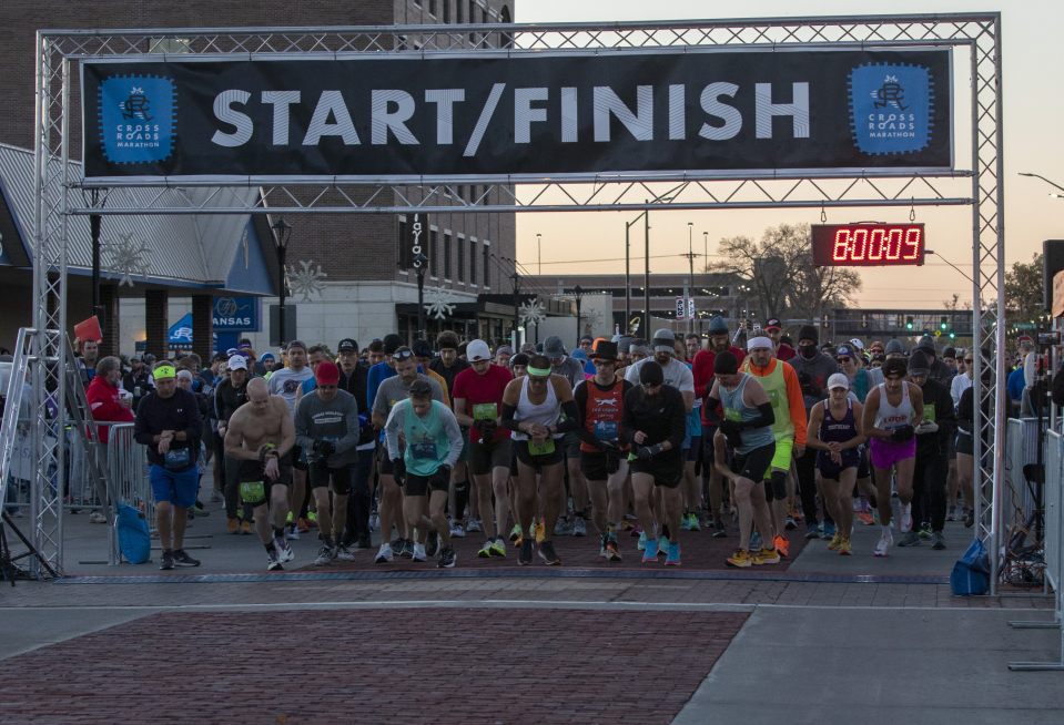 Racers take their first steps as they begin the 2022 Crossroads Marathon in Salina. This year's race will take place on Nov. 4 beginning and ending again in downtown Salina.