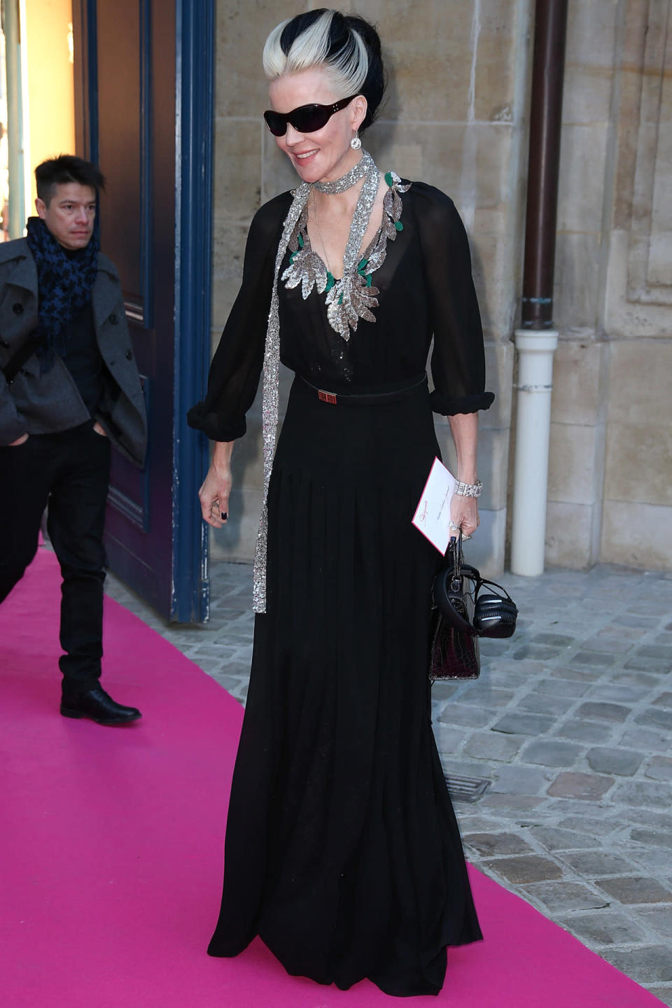 Daphne Guinness in a black belted dress at the Schiaparelli spring/summer 2016 haute couture show in Paris. 