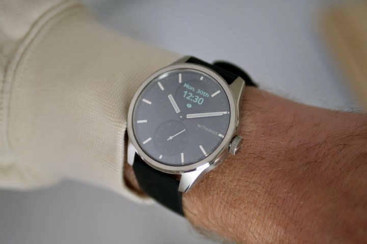 A person wearing the Withings ScanWatch 2.