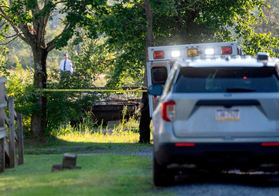 State police at Rockview investigate a homicide along the railroad tracks in Rush Township on Aug. 19, 2022.