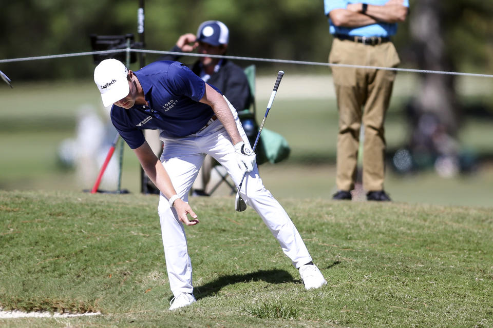 Ben Griffin studies the lie of his ball near the second fairway during the third day of the Sanderson Farms Championship golf tournament in Jackson, Miss., Saturday, Oct 7, 2023. (James Pugh/impact601.com via AP)