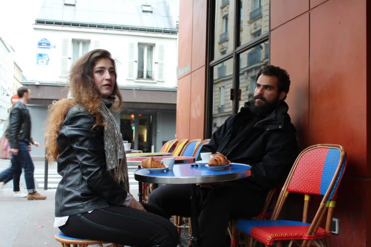 Siblings Mohammad and Anmar Hijazi at a cafe on Paris on the morning of the French presidential election. (Photo by Shawn Carrié) 