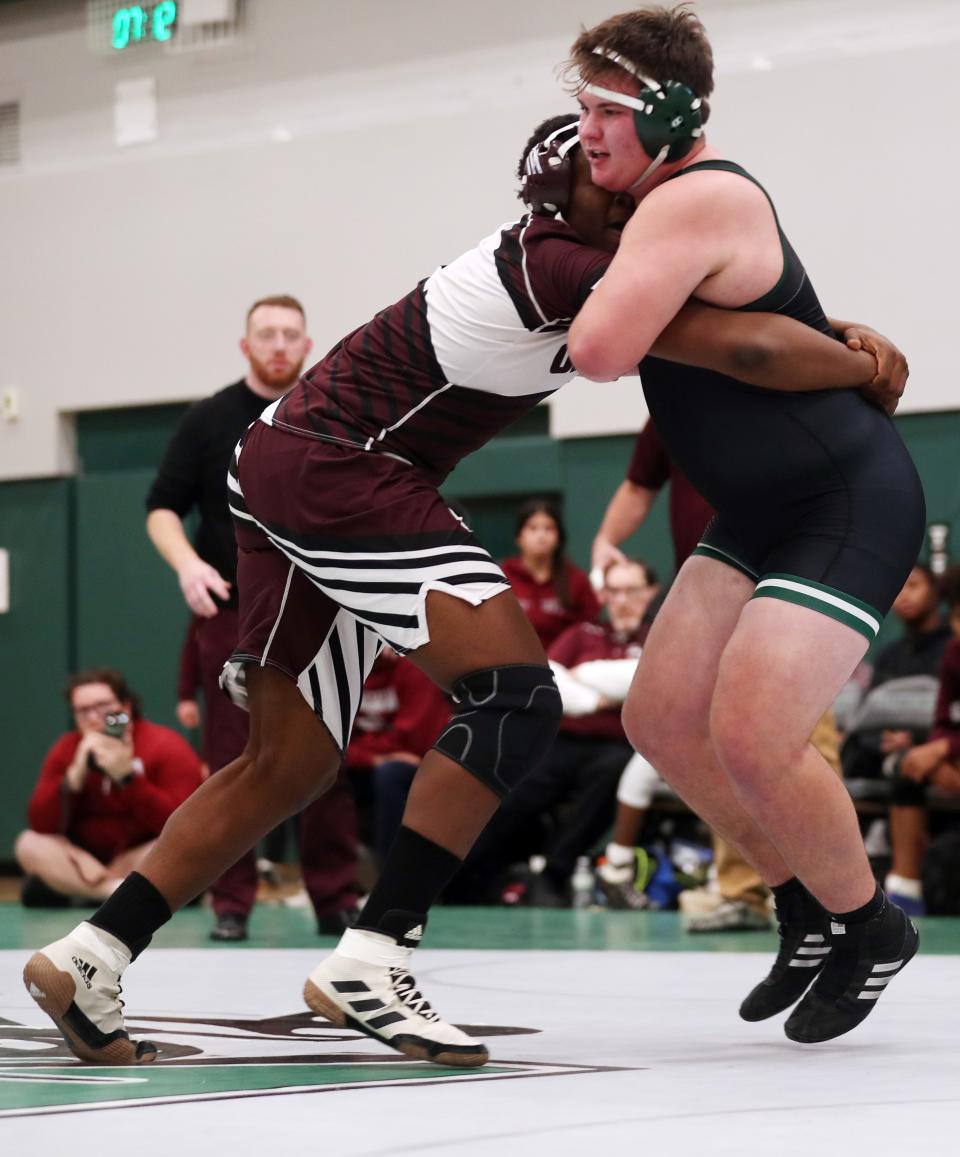 George Gjergji from Yorktown andMarlon Wheatley from Ossining wrestle in the 285-pound weight class during the Section 1 Division I Dual Meet Tournament at Yorktown High School Dec. 21, 2023. Gjergji won the match.