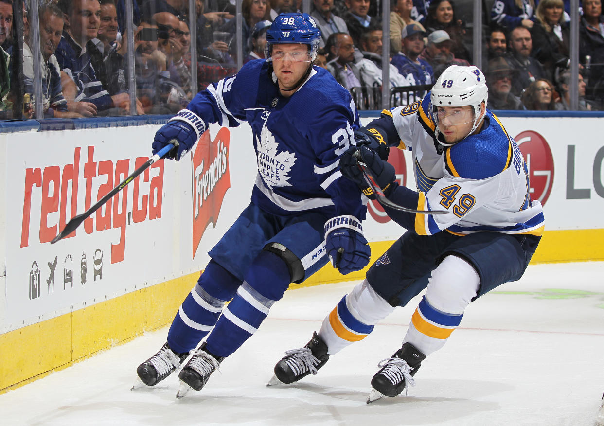 TORONTO, ON - OCTOBER 7:  Ivan Barbashev #49 of the St. Louis Blues skates against Rasmus Sandin #38 of the Toronto Maple Leafs during an NHL game at Scotiabank Arena on October 7, 2019 in Toronto, Ontario, Canada. (Photo by Claus Andersen/Getty Images)