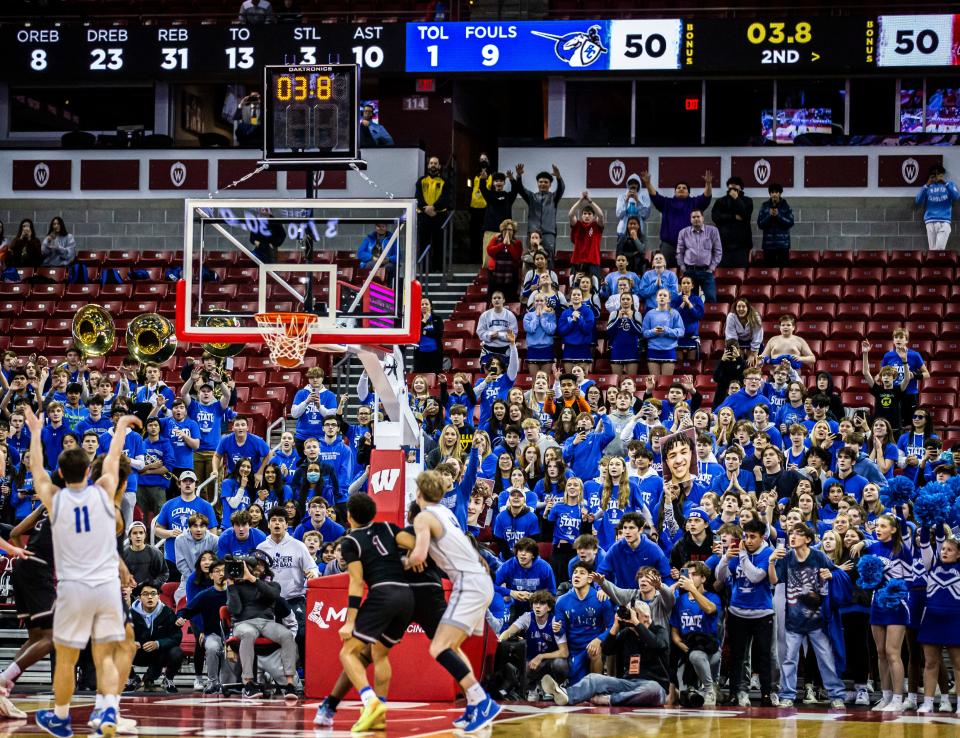 Brookfield Central's Bennett Murray (11) hits the second of two free throws to secure a 51-50 victory over Menomonee Falls in the final seconds of their WIAA Division 1 state boys basketball semifinal at the Kohl Center in Madison on Friday, March 18, 2022.