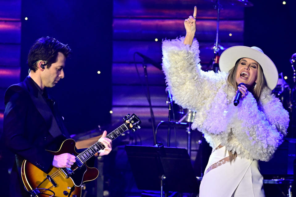 US singer-songwriter Lainey Wilson and British musician Mark Ronson perform onstage during the Recording Academy and Clive Davis' Salute To Industry Icons pre-Grammy gala at the Beverly Hilton hotel in Beverly Hills, California on February 3, 2024. (Photo by Frederic J. Brown / AFP)