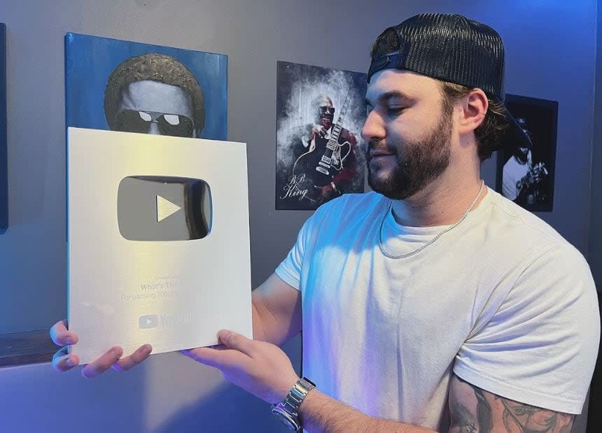 Matthew Smith received this YouTube Creator Award for passing 100,000 subscribers. As of Saturday, "What's The Dirt" has over 362,000 subscribers and a total view count of over 73 million.