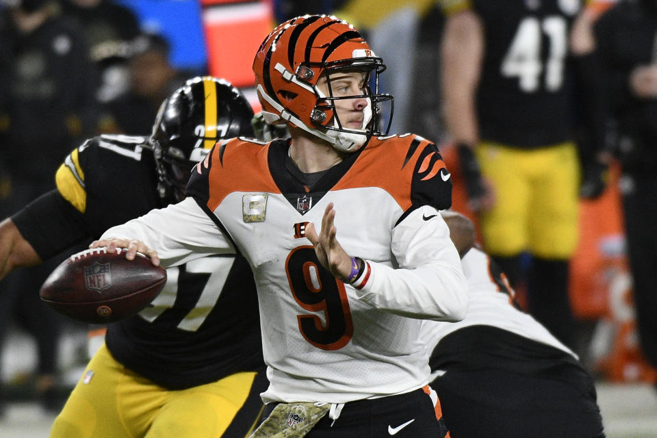 Cincinnati Bengals quarterback Joe Burrow (9) throws a pass during the second half of an NFL football game against the Pittsburgh Steelers in Pittsburgh, Sunday, Nov. 15, 2020. (AP Photo/Don Wright)
