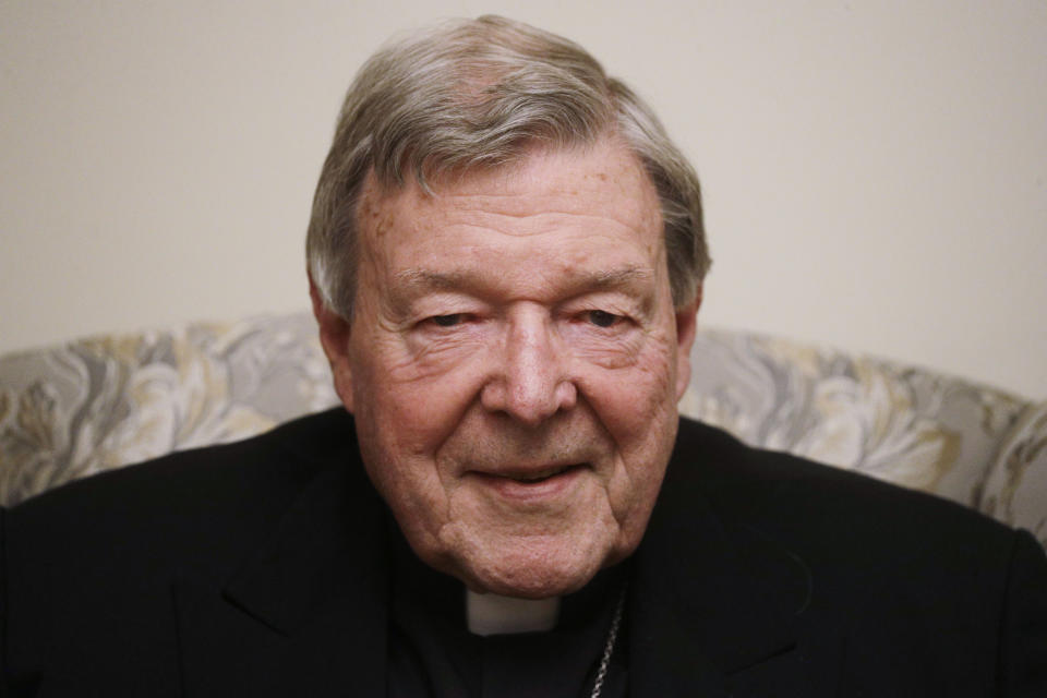 FILE — Australian Cardinal George Pell is interviewed by The Associated Press in his house at the Vatican in this Thursday, May 20, 2021 file photo. Cardinal Angelo Becciu testifying at the Vatican's big financial fraud trial, Thursday, May 5, 2022 . Lawyers for the once-powerful Cardinal Angelo Becciu have accused Vatican prosecutors of being “prisoners to their completely shattered theory", including longstanding allegations against him by Cardinal George Pell, in closing arguments of a two-year trial. Becciu is on trial along with nine other people in a case that is focused on the Vatican’s 350 million-euro investment in a London property. (AP Photo/Gregorio Borgia)