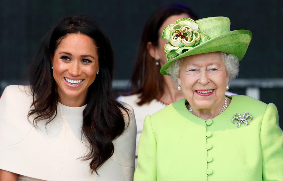 Meghan, Duchess of Sussex and Queen Elizabeth II sit together at a ceremony to open the new Mersey Gateway Bridge on June 14, 2018 in Widnes, England