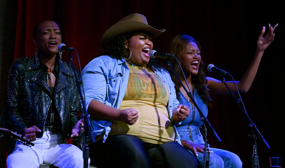 Trea Swindle, left, Dancia Hart, and Devynn Hart of Chapel Hart perform at the CMT Next Women of Country event on Sept. 28  in Nashville.