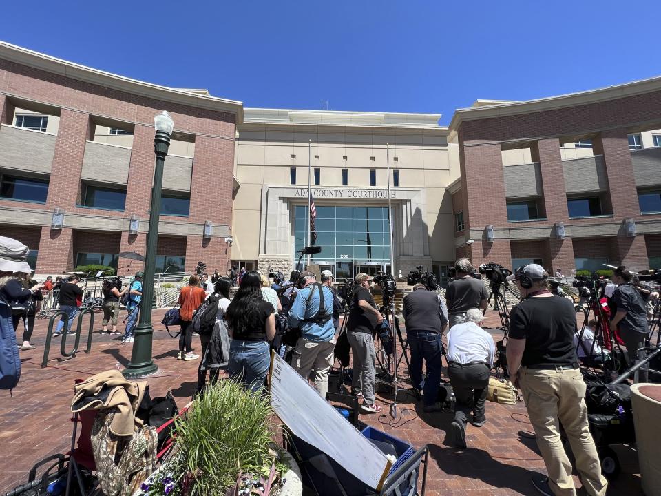 Media and other onlookers await a verdict in the trial of Lori Vallow Daybell on Friday, May 12, 2023, in Boise, Idaho. Daybell was convicted of murder for the death of her two youngest children and a romantic rival, as well as other charges, after a trial that focused on her involvement in a bizarre, doomsday-like plot. (AP Photo/Rebecca Boone)