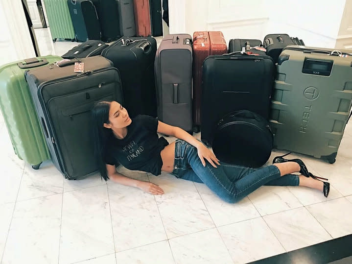 Ready for anything: Chalita with 11 of her 17 cases [Photo: SWNS]