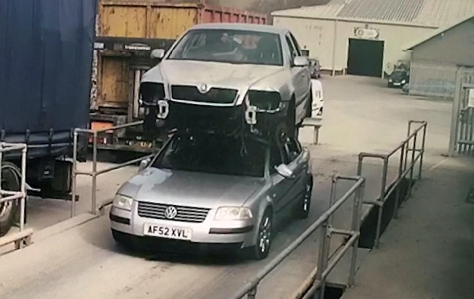 Glyndwr Wyn Richards, 51, strapped the motor to the top of a different one to transport it on an industrial estate (Picture: SWNS)