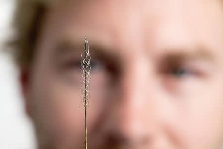 A stentrode, the size of a matchstick and planted inside a blood vessel near the brain, is seen in this January 20, 2016 handout photo released by the University of Melbourne. REUTERS/University of Melbourne/Handout via Reuters