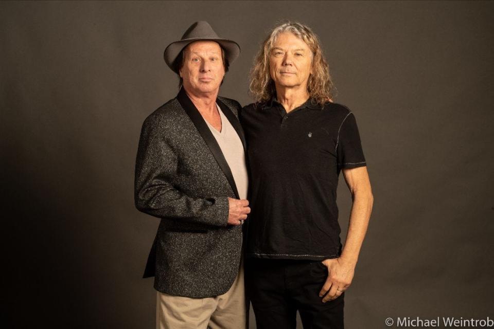 Adrian Belew and Jerry Harrison are headed our way.