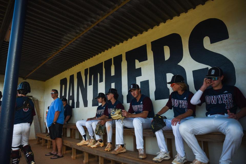 The Dwyer Panthers are seen sitting in the Dwyer dugout during the high school baseball game between Trinity Christian and host Dwyer in Palm Beach Gardens, FL., on Tuesday, April 19, 2022. Final score, Trinity Christian, 3, Dwyer, 2.