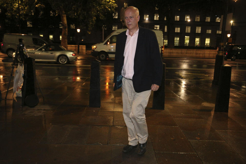 Britain's Transport Secretary Chris Grayling arrives at the Cabinet Office in Whitehall, London, Friday, July 19, 2019, ahead of an emergency Cobra meeting which has been called after British oil tanker Stena Impero was seized in the Strait of Hormuz. (Jonathan Brady/PA via AP)