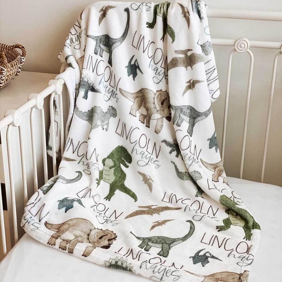 <p><a href="https://go.redirectingat.com?id=74968X1596630&url=https%3A%2F%2Fcadenlane.com%2Fcollections%2Fkids-personalized-blankets%2Fproducts%2Fdinosaur-friends-personalized-toddler-blanket&sref=https%3A%2F%2Fwww.womansday.com%2Flife%2Fg982%2Fgifts-for-kids%2F" rel="nofollow noopener" target="_blank" data-ylk="slk:Shop Now;elm:context_link;itc:0;sec:content-canvas" class="link ">Shop Now</a></p><p>Dinosaur Friends Personalized Toddler Blanket</p><p>cadenlane.com</p><p>$68.00</p>