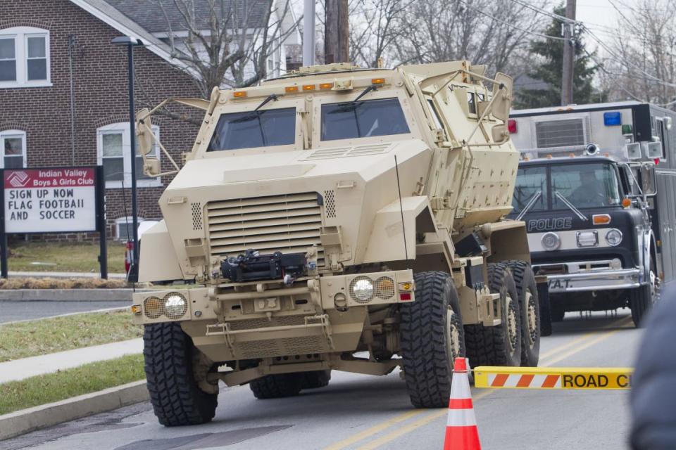 <div class="inline-image__caption"><p>A police armored vehicle is seen near a home in a suburb of Philadelphia in 2014. </p></div> <div class="inline-image__credit">Brad Larrison/Reuters</div>